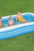 Bestway inflatable rectangular paddling pool with family inside

Top-down view of Bestway blue inflatable pool

Inflatable pool on grass with children playing

Side angle of Bestway pool showing two air chambers

Dimensions of Bestway family pool

Family enjoying inflatable pool in the backyard

Rectangular Bestway paddling pool setup outdoors