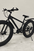 Deviant 26 inch fat tire bike side view on beach
Close-up of Shimano gear and disc brakes
All-terrain mountain bike with wide tires
Fat bike for snow, sand, and trails - Deviant 26 inch