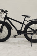Deviant 26 inch fat tire bike side view on beach
Close-up of Shimano gear and disc brakes
All-terrain mountain bike with wide tires
Fat bike for snow, sand, and trails - Deviant 26 inch