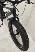 Deviant 26 inch fat tire bike side view on beach
Close-up of Shimano gear and disc brakes
All-terrain mountain bike with wide tires
Fat bike for snow, sand, and trails - Deviant 26 inch
