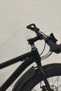 Deviant 26 inch fat tire bike side view on beach
Close-up of Shimano gear and disc brakes
All-terrain mountain bike with wide tires
Fat bike for snow, sand, and trails - Deviant 26 inch