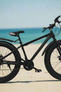 Deviant 26 inch fat tire bike side view on beach
Close-up of Shimano gear and disc brakes
All-terrain mountain bike with wide tires
Fat bike for snow, sand, and trails - Deviant 26 inch