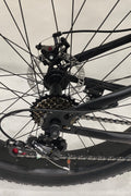 Deviant 26 inch fat tire bike side view on beach
Close-up of Shimano gear and disc brakes
All-terrain mountain bike with wide tires
Fat bike for snow, sand, and trails - Deviant 26 inch