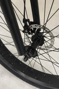 Deviant 26 inch fat tire bike side view on beach
Close-up of Shimano gear and disc brakes
All-terrain mountain bike with wide tires
Fat bike for snow, sand, and trails - Deviant 26 inch