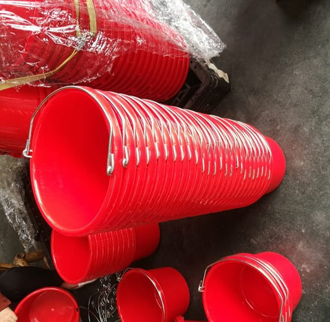Assorted red plastic livestock water pails with handles – lightweight

