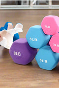 6-piece neoprene dumbbell set with 2, 3, 5 lb weights and storage rack
Color-coded neoprene dumbbells with anti-roll hex shape
Vertical rack holding pink, blue, and purple dumbbells for home fitness
Non-slip dumbbell set with compact stand for small spaces
