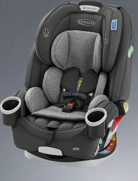 Graco 4Ever 4-in-1 car seat in gray black fabric, angled front view

Graco car seat installation and adjustment positions (4 modes)

Closeup of harness system adjustment knob

Parent placing child in highback booster setup

Side view showing headrest and belt path