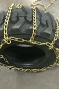Heavy Duty Bobcat Skid Steer Tire Chains – 10x16.5 & 12x16.5 | Twist & Square Link - with SLTC12165 – 12x16.5 Twist Link Tire Chains | Sold by Uncle Wiener's Wholesale