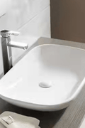 Modern countertop bathroom sink basin in white ceramic
Above counter square vessel sink installed on wooden vanity
Bathroom vanity bowl with chrome faucet and soap dispenser
Dimensions of square countertop sink with standard drain hole
Side and top view of glossy white vessel sink for powder room
