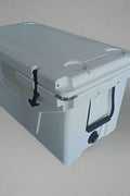 Low-profile cooler design with rugged wheels and molded side handles