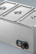 3-pan buffet food warmer front view with lid open

Commercial food warmer showing stainless steel interior

Temperature knob and heating element close-up

Buffet setup with food in all three compartments

Side view of removable pans with food steam