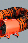 12" industrial blower fan with attached orange hose

Side view of portable utility exhaust fan

Flexible 25 ft ventilation hose included

Blower fan setup with duct for construction use

Rear fan view with protective grill and carry handle