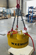 Heavy-duty yellow electric lifting magnet suspended by chains
Battery-powered scrap metal electromagnet 12V/24V industrial grade
Excavator lifting scrap metal with 23.6-inch and 40-inch electric magnet