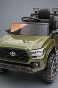 Olive green Toyota-style ride-on pickup truck for kids

Side view of remote-control kids truck with leather seat

Child’s electric ride-on truck with LED headlights

Toyota ride-on truck in olive green with suspension

Battery-powered pickup truck for toddlers