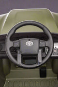 Olive green Toyota-style ride-on pickup truck for kids

Side view of remote-control kids truck with leather seat

Child’s electric ride-on truck with LED headlights

Toyota ride-on truck in olive green with suspension

Battery-powered pickup truck for toddlers