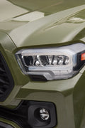 Olive green Toyota-style ride-on pickup truck for kids

Side view of remote-control kids truck with leather seat

Child’s electric ride-on truck with LED headlights

Toyota ride-on truck in olive green with suspension

Battery-powered pickup truck for toddlers