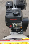 15 HP Kohler electric start wood chipper – trailer mounted front view
Side profile of 420cc wood chipper with hitch and tires
Chipper machine close-up showing large intake chute and rotor
Kohler engine wood chipper parked outdoors with debris