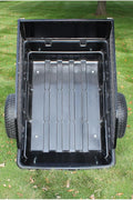 1500 lbs off-road utility trailer hitched to ATV in grass field

heavy-duty dump trailer with tilting steel bed

model 113484 utility trailer with 18-inch off-road tires

rear view of utility trailer loaded with gravel

close-up of powder-coated steel dump bed

