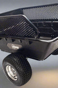 1500 lbs off-road utility trailer hitched to ATV in grass field

heavy-duty dump trailer with tilting steel bed

model 113484 utility trailer with 18-inch off-road tires

rear view of utility trailer loaded with gravel

close-up of powder-coated steel dump bed

