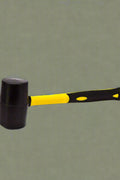 16 oz rubber mallet with fiberglass handle and black head

Soft strike mallet ideal for woodworking and tile work

Close-up of non-marring rubber head on mallet

Yellow and black rubber hammer with anti-slip grip

DIY rubber mallet for carpentry and general repairs