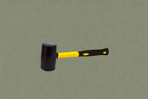 16 oz rubber mallet with fiberglass handle and black head

Soft strike mallet ideal for woodworking and tile work

Close-up of non-marring rubber head on mallet

Yellow and black rubber hammer with anti-slip grip

DIY rubber mallet for carpentry and general repairs
