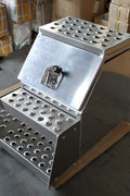 Aluminum 18" saddle step tool box – lockable crossover chest front view

Side angle of aluminum truck tool box with open lid

Locking system close-up for saddle truck toolbox

USB1802A truck tool chest in truck bed install view