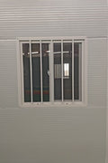 Exterior Image: Portable 19 FT Folding Insulated Container Office with Lockable Door – Outdoor View

Interior Image: Inside View of Modular Prefab Cabin Office with Window and Electrical Plug

Folded View: Foldable Prefab Container for Easy Transport and Setup

Setup Process: Step-by-step Setup of 19 FT Folding Steel Container Office

Multiple Angles: Various Views of the Portable Modular Work Cabin