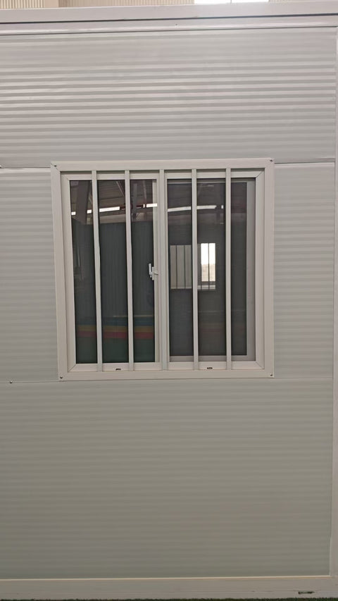 Exterior Image: Portable 19 FT Folding Insulated Container Office with Lockable Door – Outdoor View

Interior Image: Inside View of Modular Prefab Cabin Office with Window and Electrical Plug

Folded View: Foldable Prefab Container for Easy Transport and Setup

Setup Process: Step-by-step Setup of 19 FT Folding Steel Container Office

Multiple Angles: Various Views of the Portable Modular Work Cabin