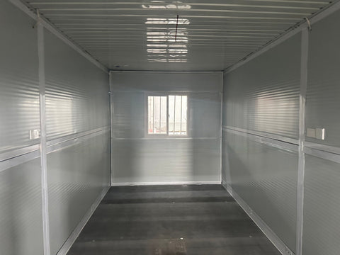 Exterior Image: Portable 19 FT Folding Insulated Container Office with Lockable Door – Outdoor View

Interior Image: Inside View of Modular Prefab Cabin Office with Window and Electrical Plug

Folded View: Foldable Prefab Container for Easy Transport and Setup

Setup Process: Step-by-step Setup of 19 FT Folding Steel Container Office

Multiple Angles: Various Views of the Portable Modular Work Cabin