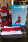 “Heavy-duty hydraulic bottle jack on steel platform”

“30-ton red bottle jack under truck”

“Close-up of 50-ton hydraulic jack with safety pin handle”