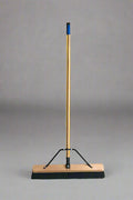 24 inch heavy-duty wood push broom for warehouse cleaning
Shop broom with long wood handle and bristle support brace
Garage floor sweeper for asphalt and concrete debris
Industrial heavy-duty broom with 60 inch handle
Bristled floor broom for outdoor surfaces and driveways
