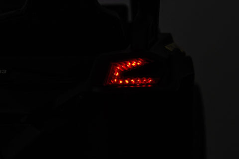 Neon Green 24V Can-Am UTV ride-on car for kids

Side view of Can-Am Maverick electric kids vehicle

Rear suspension view of 2-seater ride-on UTV

LED headlight detail on Can-Am ride-on

Kids ride-on off-road UTV in Neon Pink
