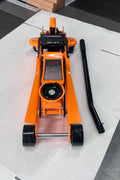 2.5 Ton Low Profile Hydraulic Floor Jack – Side View with Dual Pistons
Hydraulic Floor Jack in Orange – Lift Arm Close-up
2.5 Ton Jack – Low Clearance Front Profile
Full View of Dual Piston Hydraulic Jack with Rubber Saddle