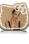 Hello Kitty LED lighted vanity mirror – front view

Oval-shaped pink and white cosmetic mirror on vanity

Mirror lit in 3 different LED color settings

Close-up of Hello Kitty bow design

Free-standing mirror on dressing table