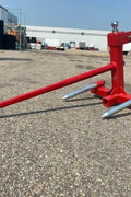 Red 3-point gooseneck hitch with bale spear mount
Tractor trailer hitch attachment with hay spear slots
Reinforced hitch frame for Conus 2 and Conus 1 spear placement
3-point trailer hitch attachment mounted on tractor
Spear holes and 2” trailer receiver on attachment frame
