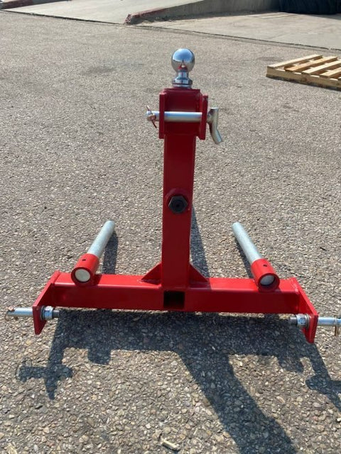 Red 3-point gooseneck hitch with bale spear mount
Tractor trailer hitch attachment with hay spear slots
Reinforced hitch frame for Conus 2 and Conus 1 spear placement
3-point trailer hitch attachment mounted on tractor
Spear holes and 2” trailer receiver on attachment frame
