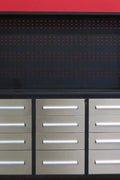 10 FT stainless steel workbench with 30 locking drawers
Heavy-duty garage tool storage cabinet with aluminum top
Industrial tool bench with black steel frame and red handles
30-drawer garage organizer with anti-slip liners and lockable drawers