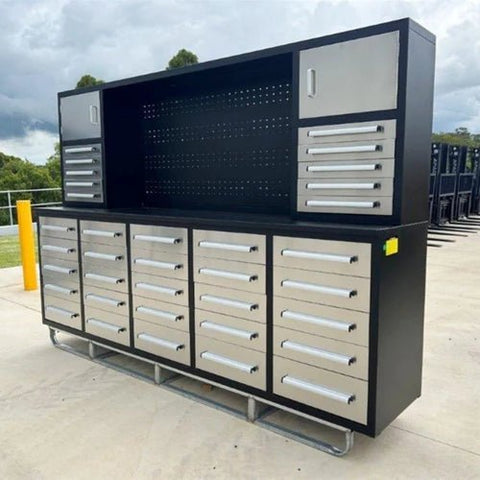10 FT stainless steel workbench with 30 locking drawers
Heavy-duty garage tool storage cabinet with aluminum top
Industrial tool bench with black steel frame and red handles
30-drawer garage organizer with anti-slip liners and lockable drawers