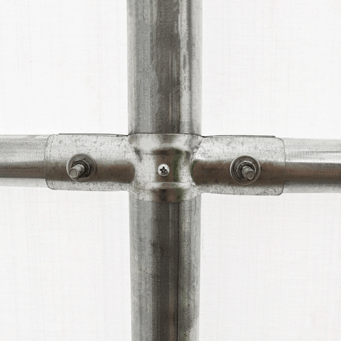 Connection detail of trussed steel tubing used in straight-wall steel buildings