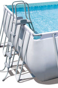 Large rectangular above ground pool with sand filter pump