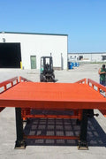Portable 33000 lb capacity loading dock with anti-slip surface


