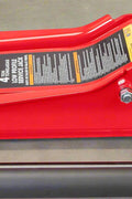 4 Ton Dual Piston Hydraulic Jack – Full Side View in Red
Low Profile Floor Jack – Close-Up of Pump and Wheels
Heavy-Duty Hydraulic Jack – Front View with Wide Frame
Dual Piston Jack – Rubber Pad and Lift Saddle Detail
Hydraulic Floor Jack – In Use with Car for Lifting Demonstration