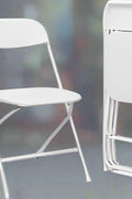 4-Pack White Plastic Folding Chairs – Stacked View