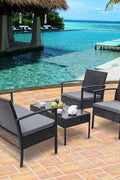 Black rattan outdoor furniture set with loveseat and chairs
4-piece outdoor patio set with glass coffee table on patio
Weather-resistant black PE rattan seating with cushions
Loveseat and two single chairs outdoor set with glass table