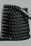 40 FT Black Heavy-Duty Battle Rope Coiled

Close-up of Textured Handle and Grip

Removable Nylon Protective Sleeve

Rope in Use – Cardio Training Session

Athlete Performing Rope Waves – Full-Body Workout

Strength Rope for CrossFit Conditioning