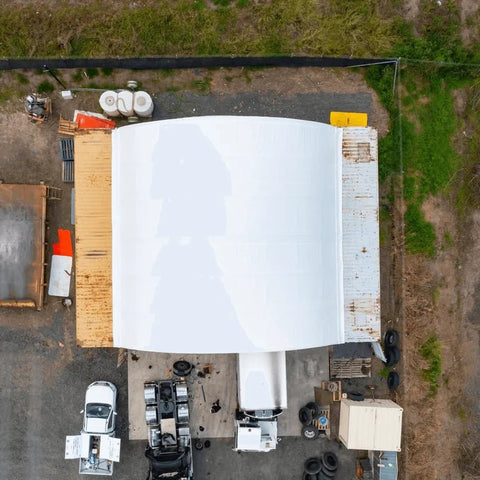 40x40x15 FT double truss fabric storage shelter mounted over shipping containers with winch door – heavy-duty PVC cover