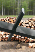 Skid steer firewood processor with 45-ton splitter attached
Log splitter with Stihl saw mounting plate
Firewood processing log cradle and splitting wedge
Heavy-duty 45-ton log processor on worksite
Operator splitting wood from skid steer seat