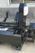 Skid steer firewood processor with 45-ton splitter attached
Log splitter with Stihl saw mounting plate
Firewood processing log cradle and splitting wedge
Heavy-duty 45-ton log processor on worksite
Operator splitting wood from skid steer seat