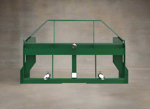 Heavy-duty green hay frame with bale spear for John Deere loader
John Deere-compatible bale spear attachment with headache rack
4500 LB hay spear frame with Conus 2 spear and fork slots