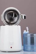 New 4L Countertop Water Distiller – 750W Stainless Steel Purifier for Home & Office Use S0615 - with | Sold by Uncle Wiener's Wholesale